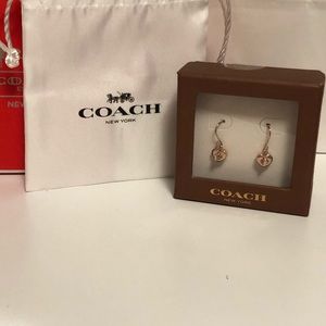 SOLD— Coach RoseGoldTurnlock Heart Earrings